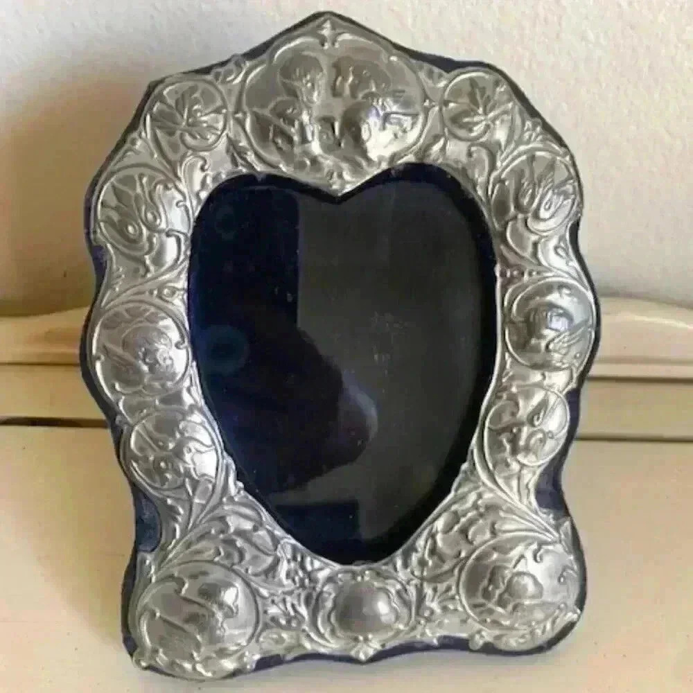 vintage picture frame heart shaped with cherubs